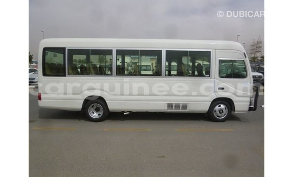 Acheter Import Voiture Toyota Coaster Blanc à Import - Dubai, Conakry Acheter Import Voiture Toyota Coaster Blanc à Import - Dubai, Conakry