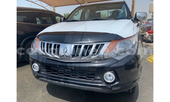 Buy Import Mitsubishi L200 Black Car in Import - Dubai in Conakry Buy Import Mitsubishi L200 Black Car in Import - Dubai in Conakry
