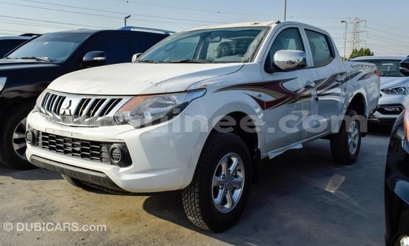 Buy Import Mitsubishi L200 White Car in Import - Dubai in Conakry Buy Import Mitsubishi L200 White Car in Import - Dubai in Conakry