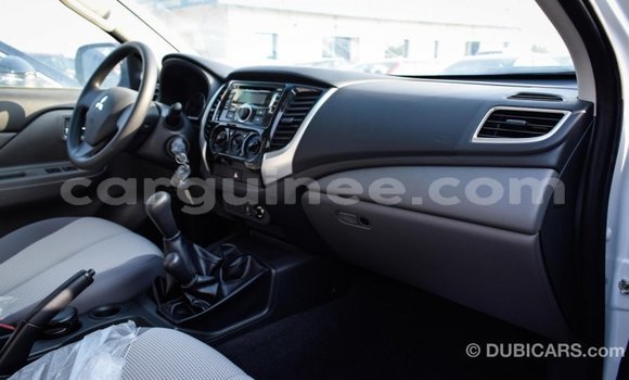 Buy Import Mitsubishi L200 White Car in Import - Dubai in Conakry Buy Import Mitsubishi L200 White Car in Import - Dubai in Conakry