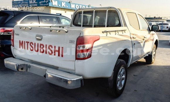 Buy Import Mitsubishi L200 White Car in Import - Dubai in Conakry Buy Import Mitsubishi L200 White Car in Import - Dubai in Conakry