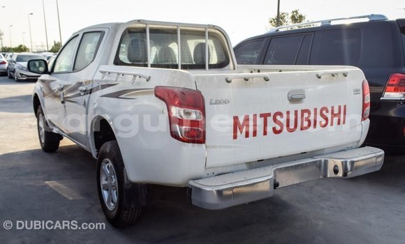 Buy Import Mitsubishi L200 White Car in Import - Dubai in Conakry Buy Import Mitsubishi L200 White Car in Import - Dubai in Conakry