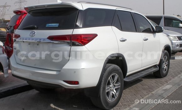 Buy Import Toyota Fortuner White Car in Import - Dubai in Conakry Buy Import Toyota Fortuner White Car in Import - Dubai in Conakry