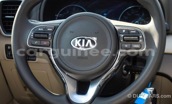 Buy Import Kia Sportage Red Car in Import - Dubai in Conakry Buy Import Kia Sportage Red Car in Import - Dubai in Conakry