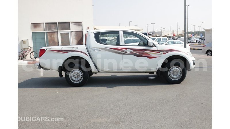 Big with watermark mitsubishi l200 conakry import dubai 3785