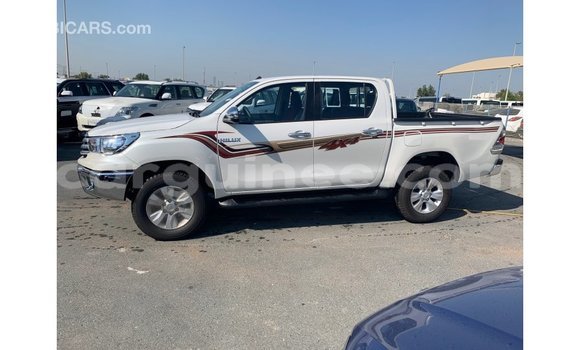 Buy Import Toyota Hilux White Car in Import - Dubai in Conakry Buy Import Toyota Hilux White Car in Import - Dubai in Conakry