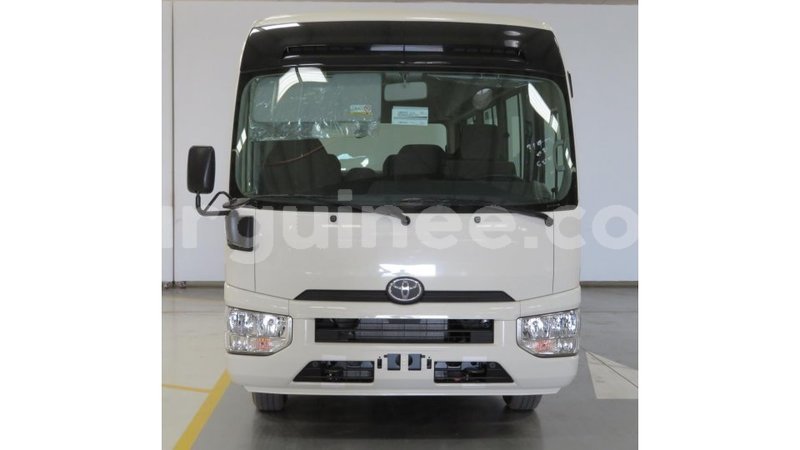 Big with watermark toyota coaster conakry import dubai 4057