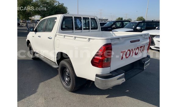 Buy Import Toyota Hilux White Car in Import - Dubai in Conakry Buy Import Toyota Hilux White Car in Import - Dubai in Conakry