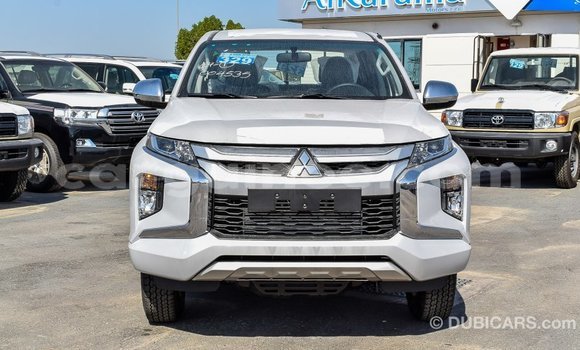 Buy Import Mitsubishi L200 White Car in Import - Dubai in Conakry Buy Import Mitsubishi L200 White Car in Import - Dubai in Conakry