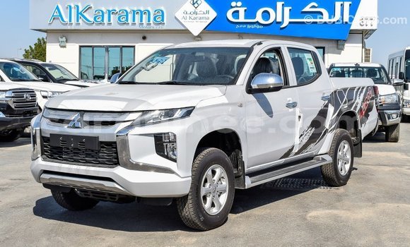 Buy Import Mitsubishi L200 White Car in Import - Dubai in Conakry Buy Import Mitsubishi L200 White Car in Import - Dubai in Conakry