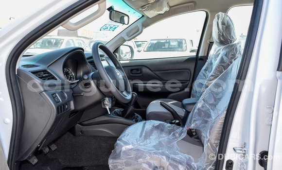 Buy Import Mitsubishi L200 White Car in Import - Dubai in Conakry Buy Import Mitsubishi L200 White Car in Import - Dubai in Conakry