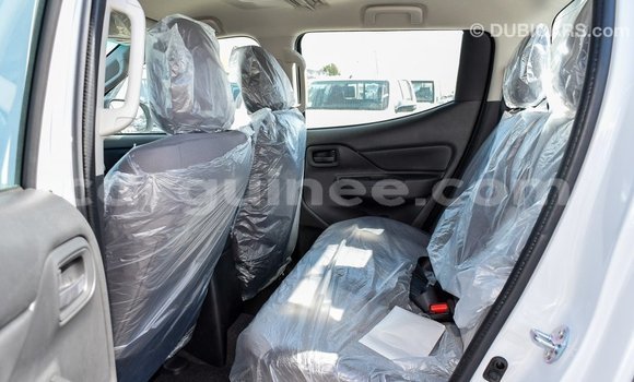 Buy Import Mitsubishi L200 White Car in Import - Dubai in Conakry Buy Import Mitsubishi L200 White Car in Import - Dubai in Conakry