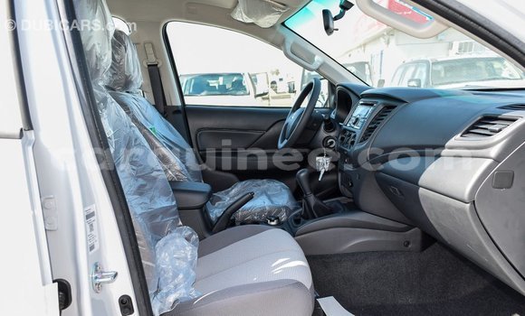 Buy Import Mitsubishi L200 White Car in Import - Dubai in Conakry Buy Import Mitsubishi L200 White Car in Import - Dubai in Conakry