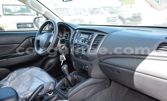 Buy Import Mitsubishi L200 White Car in Import - Dubai in Conakry Buy Import Mitsubishi L200 White Car in Import - Dubai in Conakry