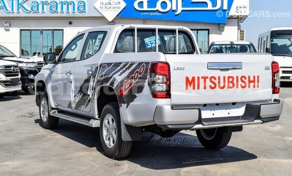 Buy Import Mitsubishi L200 White Car in Import - Dubai in Conakry Buy Import Mitsubishi L200 White Car in Import - Dubai in Conakry