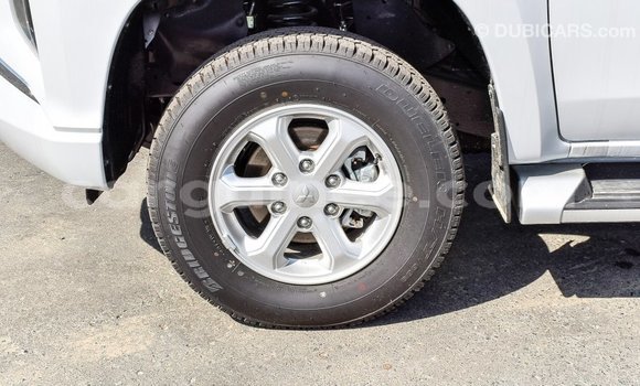 Buy Import Mitsubishi L200 White Car in Import - Dubai in Conakry Buy Import Mitsubishi L200 White Car in Import - Dubai in Conakry