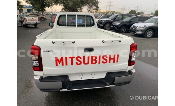 Buy Import Mitsubishi L200 White Car in Import - Dubai in Conakry Buy Import Mitsubishi L200 White Car in Import - Dubai in Conakry