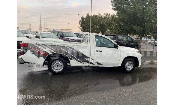 Buy Import Mitsubishi L200 White Car in Import - Dubai in Conakry Buy Import Mitsubishi L200 White Car in Import - Dubai in Conakry