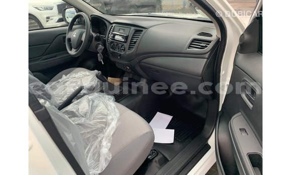 Buy Import Mitsubishi L200 White Car in Import - Dubai in Conakry Buy Import Mitsubishi L200 White Car in Import - Dubai in Conakry