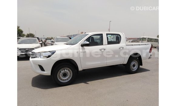 Buy Import Toyota Hilux White Car in Import - Dubai in Conakry Buy Import Toyota Hilux White Car in Import - Dubai in Conakry