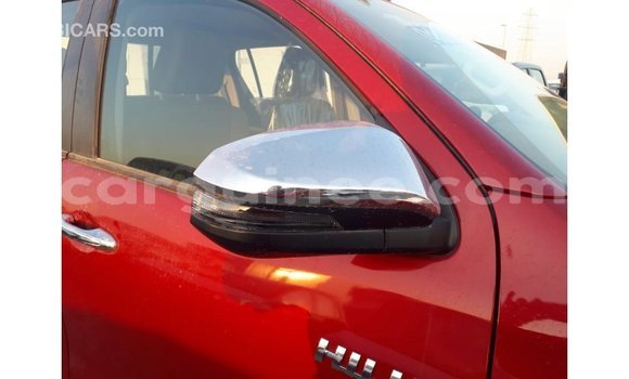 Buy Import Toyota Hilux Red Car in Import - Dubai in Conakry Buy Import Toyota Hilux Red Car in Import - Dubai in Conakry