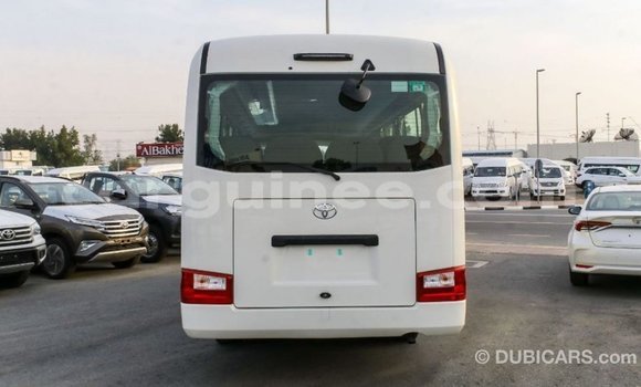 Acheter Import Voiture Toyota Coaster Blanc à Import - Dubai, Conakry Acheter Import Voiture Toyota Coaster Blanc à Import - Dubai, Conakry