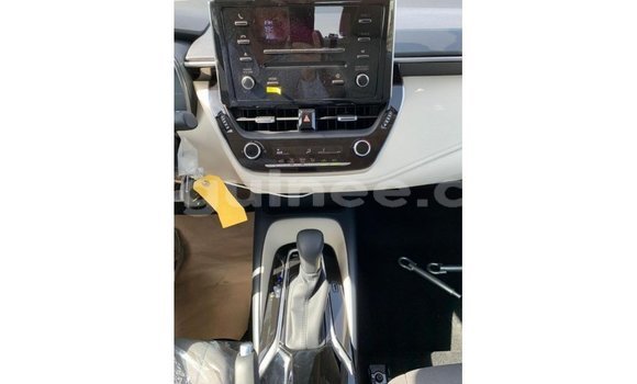 Acheter Import Voiture Toyota Corolla Blanc à Import - Dubai, Conakry Acheter Import Voiture Toyota Corolla Blanc à Import - Dubai, Conakry