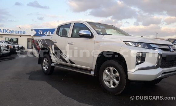 Buy Import Mitsubishi L200 White Car in Import - Dubai in Conakry Buy Import Mitsubishi L200 White Car in Import - Dubai in Conakry