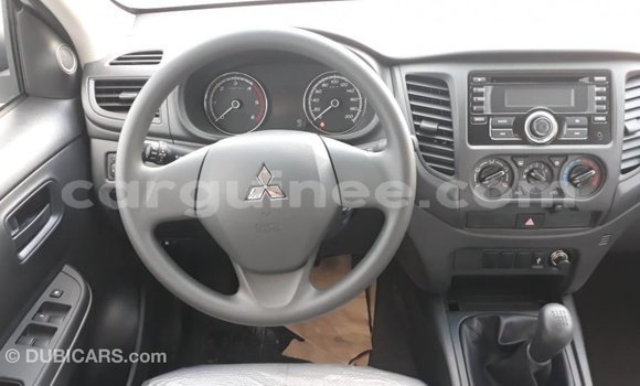 Buy Import Mitsubishi L200 White Car in Import - Dubai in Conakry Buy Import Mitsubishi L200 White Car in Import - Dubai in Conakry