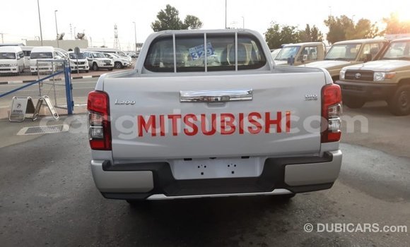 Buy Import Mitsubishi L200 White Car in Import - Dubai in Conakry Buy Import Mitsubishi L200 White Car in Import - Dubai in Conakry