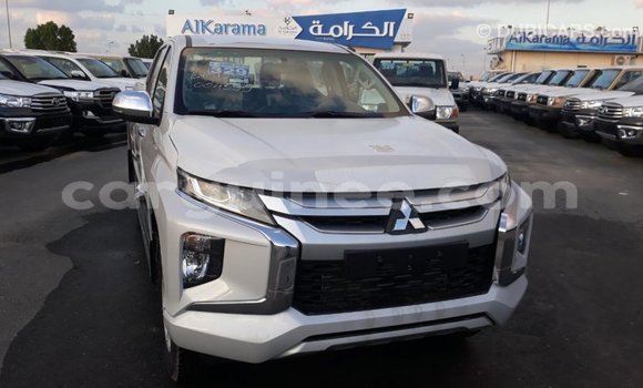 Buy Import Mitsubishi L200 White Car in Import - Dubai in Conakry Buy Import Mitsubishi L200 White Car in Import - Dubai in Conakry
