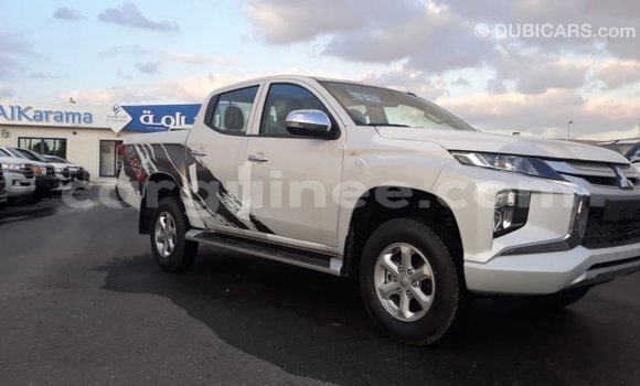 Buy Import Mitsubishi L200 White Car in Import - Dubai in Conakry Buy Import Mitsubishi L200 White Car in Import - Dubai in Conakry