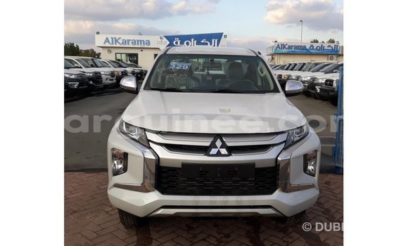 Buy Import Mitsubishi L200 White Car in Import - Dubai in Conakry Buy Import Mitsubishi L200 White Car in Import - Dubai in Conakry