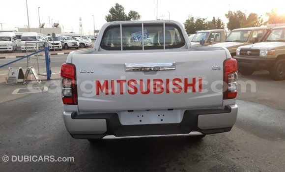 Buy Import Mitsubishi L200 White Car in Import - Dubai in Conakry Buy Import Mitsubishi L200 White Car in Import - Dubai in Conakry