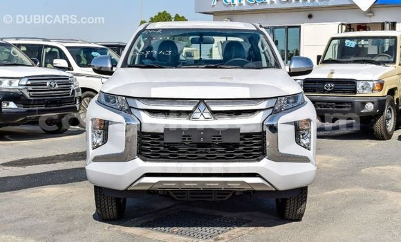 Buy Import Mitsubishi L200 White Car in Import - Dubai in Conakry Buy Import Mitsubishi L200 White Car in Import - Dubai in Conakry