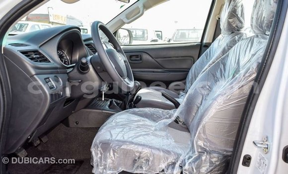 Buy Import Mitsubishi L200 White Car in Import - Dubai in Conakry Buy Import Mitsubishi L200 White Car in Import - Dubai in Conakry