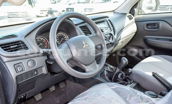 Buy Import Mitsubishi L200 White Car in Import - Dubai in Conakry Buy Import Mitsubishi L200 White Car in Import - Dubai in Conakry
