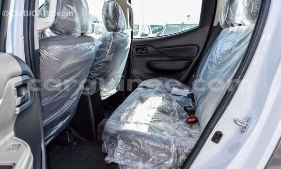 Buy Import Mitsubishi L200 White Car in Import - Dubai in Conakry Buy Import Mitsubishi L200 White Car in Import - Dubai in Conakry