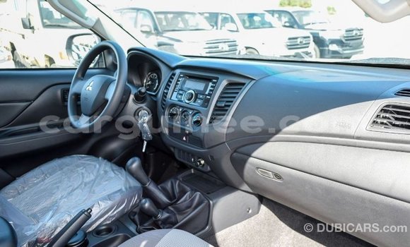 Buy Import Mitsubishi L200 White Car in Import - Dubai in Conakry Buy Import Mitsubishi L200 White Car in Import - Dubai in Conakry