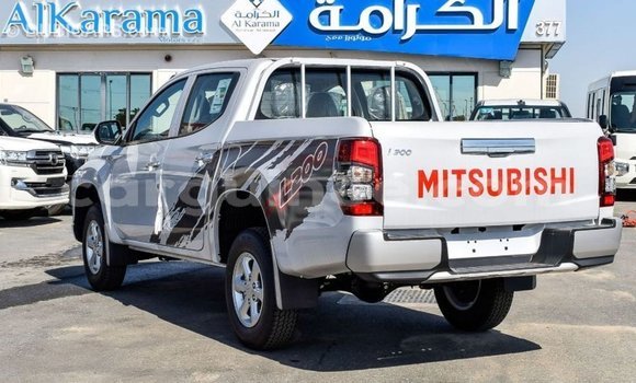 Buy Import Mitsubishi L200 White Car in Import - Dubai in Conakry Buy Import Mitsubishi L200 White Car in Import - Dubai in Conakry