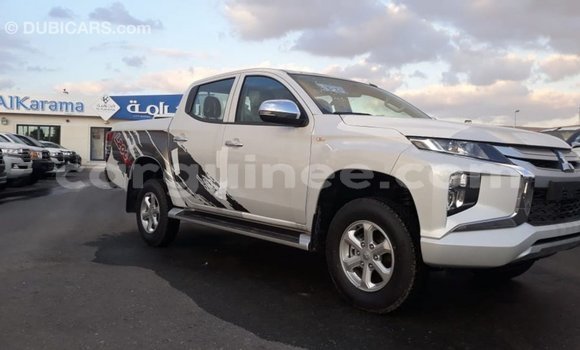 Buy Import Mitsubishi L200 White Car in Import - Dubai in Conakry Buy Import Mitsubishi L200 White Car in Import - Dubai in Conakry