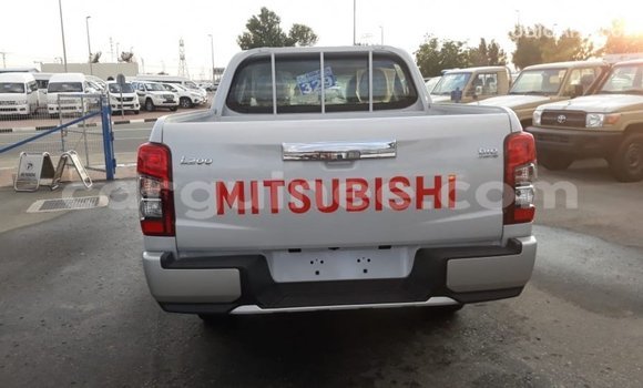 Buy Import Mitsubishi L200 White Car in Import - Dubai in Conakry Buy Import Mitsubishi L200 White Car in Import - Dubai in Conakry