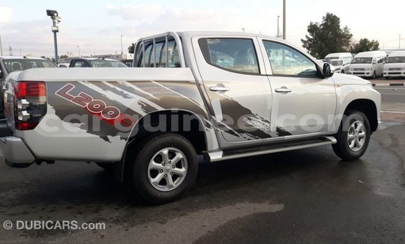 Buy Import Mitsubishi L200 White Car in Import - Dubai in Conakry Buy Import Mitsubishi L200 White Car in Import - Dubai in Conakry