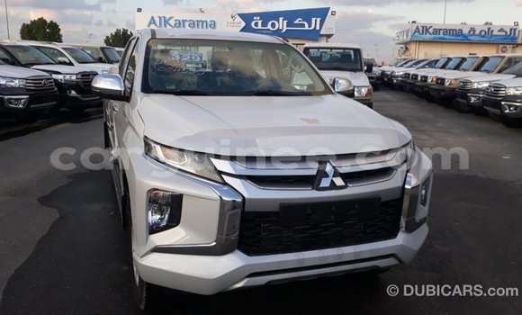 Buy Import Mitsubishi L200 White Car in Import - Dubai in Conakry Buy Import Mitsubishi L200 White Car in Import - Dubai in Conakry