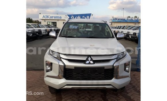 Buy Import Mitsubishi L200 White Car in Import - Dubai in Conakry Buy Import Mitsubishi L200 White Car in Import - Dubai in Conakry