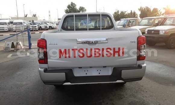 Buy Import Mitsubishi L200 White Car in Import - Dubai in Conakry Buy Import Mitsubishi L200 White Car in Import - Dubai in Conakry