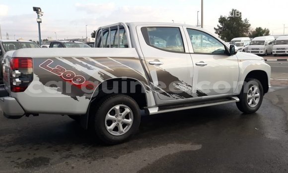 Buy Import Mitsubishi L200 White Car in Import - Dubai in Conakry Buy Import Mitsubishi L200 White Car in Import - Dubai in Conakry