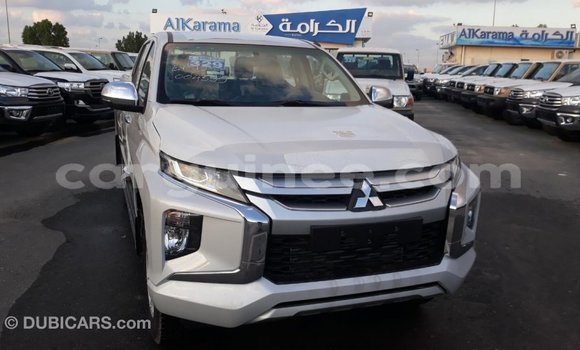 Buy Import Mitsubishi L200 White Car in Import - Dubai in Conakry Buy Import Mitsubishi L200 White Car in Import - Dubai in Conakry