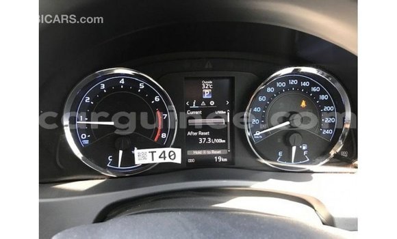 Acheter Import Voiture Toyota Corolla Blanc à Import - Dubai, Conakry Acheter Import Voiture Toyota Corolla Blanc à Import - Dubai, Conakry