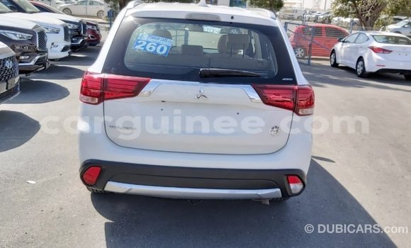 Buy Import Mitsubishi Outlander White Car in Import - Dubai in Conakry Buy Import Mitsubishi Outlander White Car in Import - Dubai in Conakry